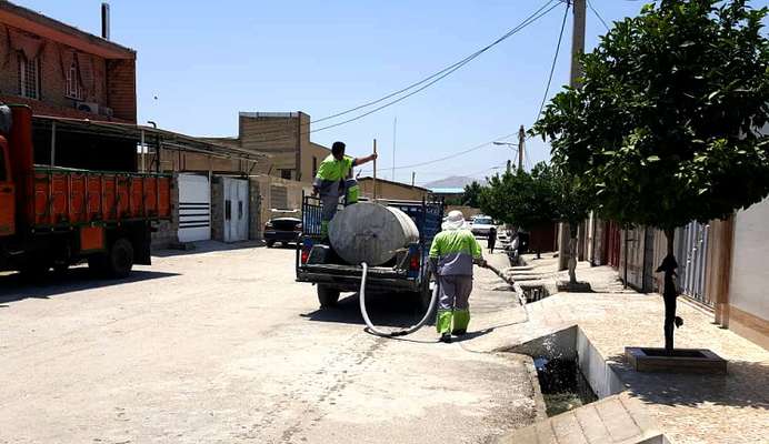 شروع فصل گرما و آهک پاشی جداول روباز سطح شهر