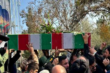 تشییع و تدفین پیکر مطهر شهید گمنام در پارک سربازان گمنام محله قم تپه