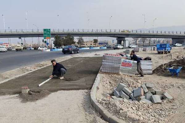 تداوم عملیات کف سازی پیاده راه اراضی میدان تیر به طول یک کیلومتر